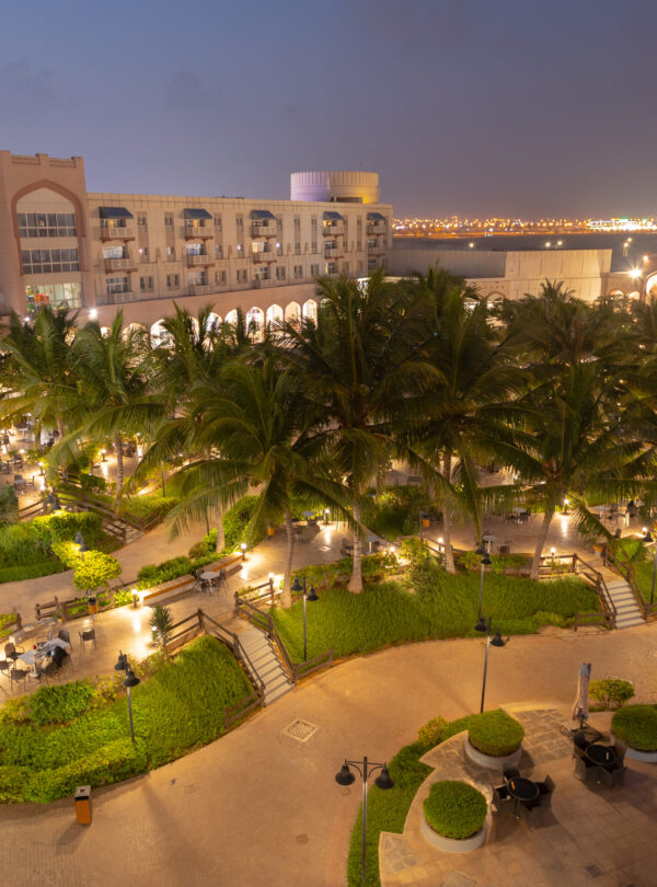 Modern interior of Salalah Gardens Mall with shops and cafés
