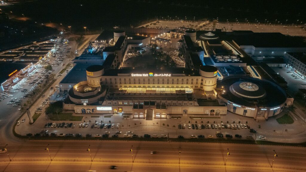 Modern interior of Salalah Gardens Mall with shops and cafés