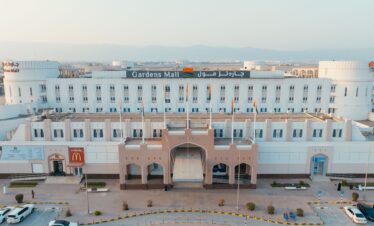 Modern interior of Salalah Gardens Mall with shops and cafés