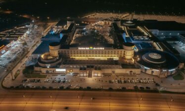 Modern interior of Salalah Gardens Mall with shops and cafés