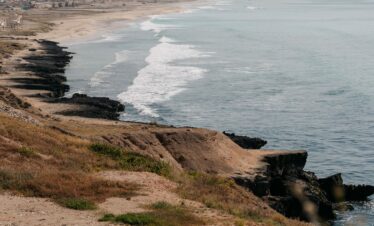 Scenic cliffs and waves at Al Mughsail Beach Dhofar