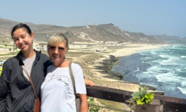 Tourists exploring Marneef Cave Dhofar