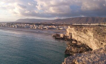 Golden sunset at Taqah Cliff during East Salalah private tour