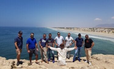 Tourists with a guide at the Taqah Viewpoint in Salalah