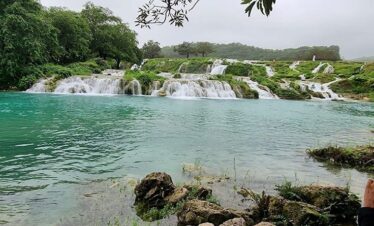 Adventure travelers enjoying Wadi Darbat nature on East Salalah Safari