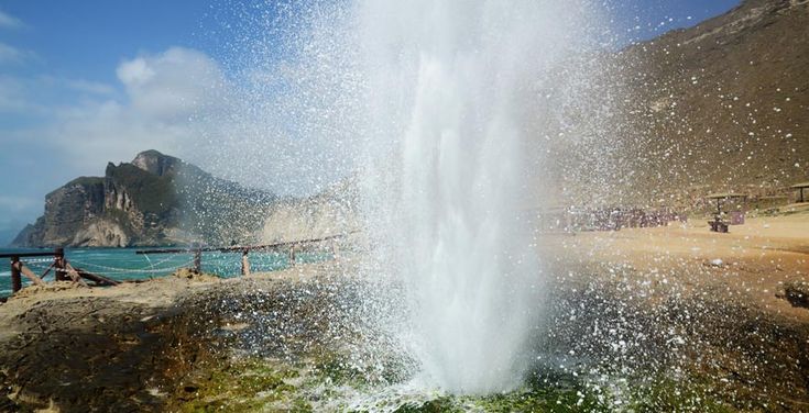 Visitors can stand safely near the wooden walkway beside Mughsail blowholes