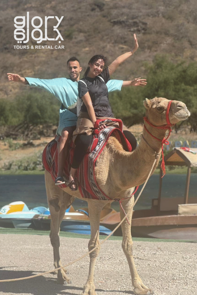 Wadi Darbat camel ride along lake