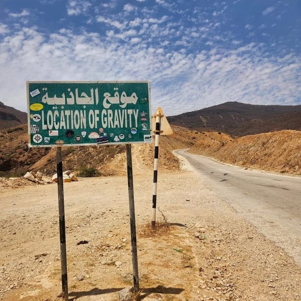 Anti Gravity Point Salalah sign marking gravity hill location