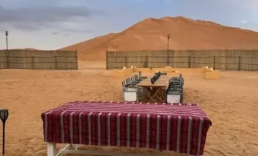 breakfast in desert camp after sunrise in Rub Al Khali