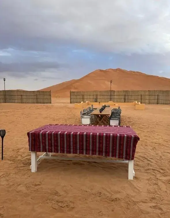 breakfast in desert camp after sunrise in Rub Al Khali