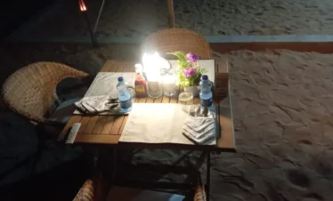 traditional dinner setup during deep desert safari Rub Al Khali